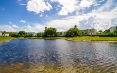 OPEN HOUSE 7/26 2pm-4pm. Waterfront Gem in Gated Toll Brothers on Hillsboro Pines Golf in Florida - for sale on GolfHomes.com, golf home, golf lot