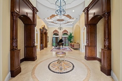 This exceptional estate, constructed by Terry Shore, is set on on  in Florida - for sale on GolfHomes.com, golf home, golf lot