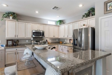 This inviting home is set at the end of a cul-de-sac with a on Revere Golf Club in Nevada - for sale on GolfHomes.com, golf home, golf lot