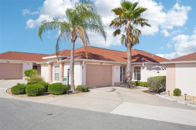 This Court Yard Villa in De Le Mesa  offers a unique private on El Diablo Executive Golf Course in Florida - for sale on GolfHomes.com, golf home, golf lot