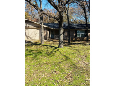 This 2bd 2ba 2 garage, large rooms has a new AC-Heat Unit on De Cordova Bend Country Club in Texas - for sale on GolfHomes.com, golf home, golf lot