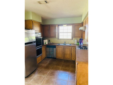 This 2bd 2ba 2 garage, large rooms has a new AC-Heat Unit on De Cordova Bend Country Club in Texas - for sale on GolfHomes.com, golf home, golf lot