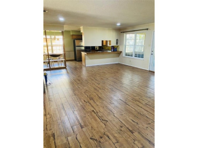 This 2bd 2ba 2 garage, large rooms has a new AC-Heat Unit on De Cordova Bend Country Club in Texas - for sale on GolfHomes.com, golf home, golf lot