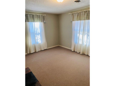 This 2bd 2ba 2 garage, large rooms has a new AC-Heat Unit on De Cordova Bend Country Club in Texas - for sale on GolfHomes.com, golf home, golf lot