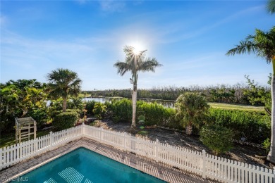Sunset skies, pool and spa, curb appeal on a desirable on The Dunes Golf and Tennis Club in Florida - for sale on GolfHomes.com, golf home, golf lot