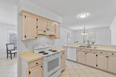 Coastal comfort meets modern updates - your dream home awaits on Pearl Golf Links in North Carolina - for sale on GolfHomes.com, golf home, golf lot