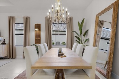 This home offers a perfect blend of luxury and comfort, with on Calusa Pines Golf Club in Florida - for sale on GolfHomes.com, golf home, golf lot