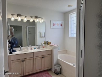 You will love this 1st floor end unit with lots of light and on St. Augustine Shores Golf Club in Florida - for sale on GolfHomes.com, golf home, golf lot
