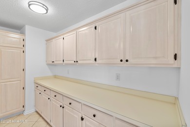 Coastal comfort meets modern updates - your dream home awaits on Pearl Golf Links in North Carolina - for sale on GolfHomes.com, golf home, golf lot