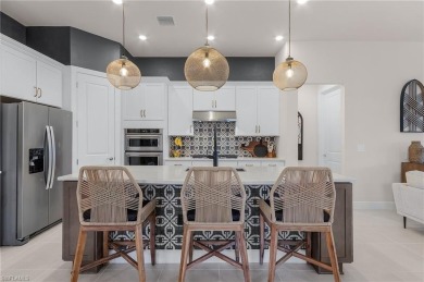 This home offers a perfect blend of luxury and comfort, with on Calusa Pines Golf Club in Florida - for sale on GolfHomes.com, golf home, golf lot