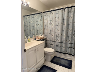 You will love this 1st floor end unit with lots of light and on St. Augustine Shores Golf Club in Florida - for sale on GolfHomes.com, golf home, golf lot