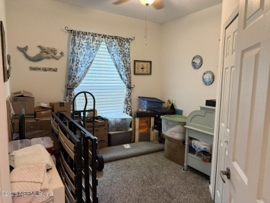 You will love this 1st floor end unit with lots of light and on St. Augustine Shores Golf Club in Florida - for sale on GolfHomes.com, golf home, golf lot