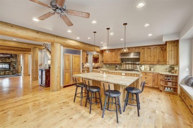 Perched on 2.17 acres with panoramic views of the Tenmile Range on Breckenridge Golf Club in Colorado - for sale on GolfHomes.com, golf home, golf lot