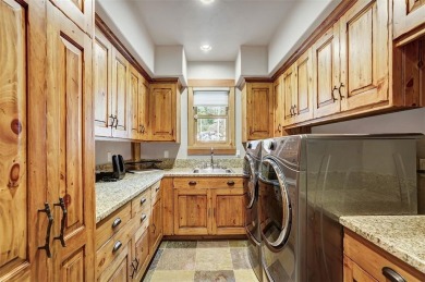 Perched on 2.17 acres with panoramic views of the Tenmile Range on Breckenridge Golf Club in Colorado - for sale on GolfHomes.com, golf home, golf lot