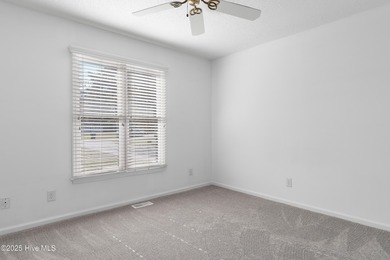 Coastal comfort meets modern updates - your dream home awaits on Pearl Golf Links in North Carolina - for sale on GolfHomes.com, golf home, golf lot