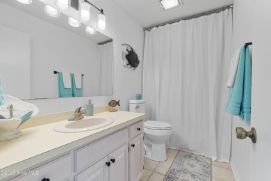 Coastal comfort meets modern updates - your dream home awaits on Pearl Golf Links in North Carolina - for sale on GolfHomes.com, golf home, golf lot