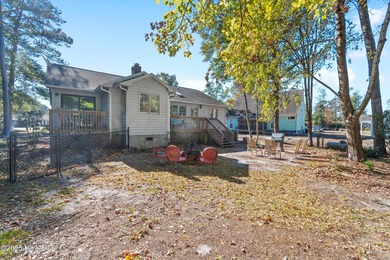 Coastal comfort meets modern updates - your dream home awaits on Pearl Golf Links in North Carolina - for sale on GolfHomes.com, golf home, golf lot