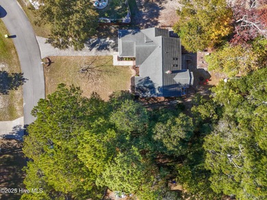 Coastal comfort meets modern updates - your dream home awaits on Pearl Golf Links in North Carolina - for sale on GolfHomes.com, golf home, golf lot