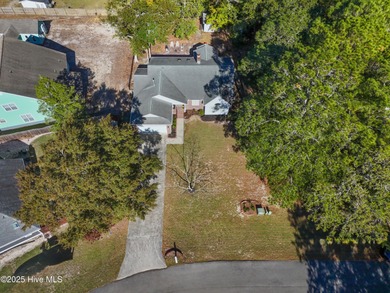 Coastal comfort meets modern updates - your dream home awaits on Pearl Golf Links in North Carolina - for sale on GolfHomes.com, golf home, golf lot