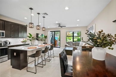 Stunning new lakefront townhouse in a gated golf course on Boca Dunes Golf and Country Club in Florida - for sale on GolfHomes.com, golf home, golf lot