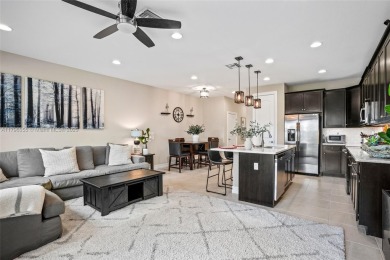 Stunning new lakefront townhouse in a gated golf course on Boca Dunes Golf and Country Club in Florida - for sale on GolfHomes.com, golf home, golf lot