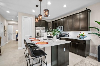 Stunning new lakefront townhouse in a gated golf course on Boca Dunes Golf and Country Club in Florida - for sale on GolfHomes.com, golf home, golf lot