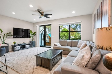 Stunning new lakefront townhouse in a gated golf course on Boca Dunes Golf and Country Club in Florida - for sale on GolfHomes.com, golf home, golf lot