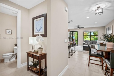 Stunning new lakefront townhouse in a gated golf course on Boca Dunes Golf and Country Club in Florida - for sale on GolfHomes.com, golf home, golf lot