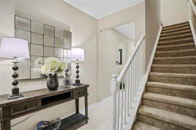 Stunning new lakefront townhouse in a gated golf course on Boca Dunes Golf and Country Club in Florida - for sale on GolfHomes.com, golf home, golf lot