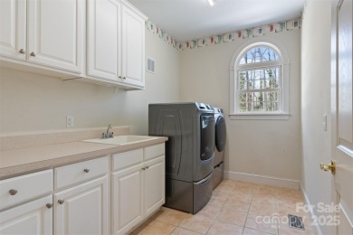 Introducing this stunning 6,000+ square feet, all brick on Rock Barn Golf and Spa in North Carolina - for sale on GolfHomes.com, golf home, golf lot