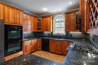 Introducing this stunning 6,000+ square feet, all brick on Rock Barn Golf and Spa in North Carolina - for sale on GolfHomes.com, golf home, golf lot