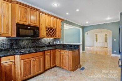 Introducing this stunning 6,000+ square feet, all brick on Rock Barn Golf and Spa in North Carolina - for sale on GolfHomes.com, golf home, golf lot