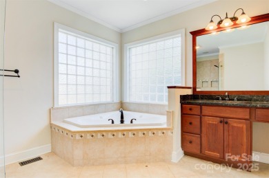 Introducing this stunning 6,000+ square feet, all brick on Rock Barn Golf and Spa in North Carolina - for sale on GolfHomes.com, golf home, golf lot
