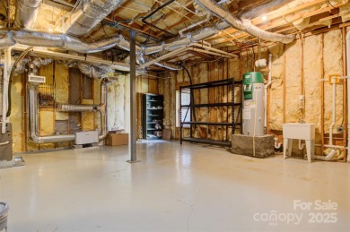 Introducing this stunning 6,000+ square feet, all brick on Rock Barn Golf and Spa in North Carolina - for sale on GolfHomes.com, golf home, golf lot