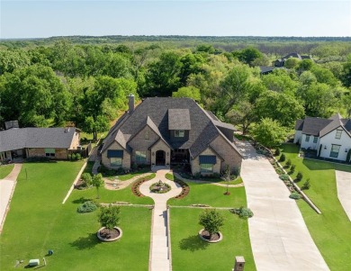 MOTIVATED SELLER! This could be your dream home in prestigious on Pecan Plantation Country Club in Texas - for sale on GolfHomes.com, golf home, golf lot