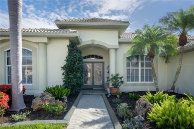 Curb appeal w/custom Landscaping, Dynamic Interior & private on Pelican Pointe Golf and Country Club in Florida - for sale on GolfHomes.com, golf home, golf lot