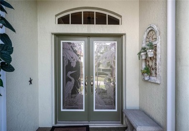 Curb appeal w/custom Landscaping, Dynamic Interior & private on Pelican Pointe Golf and Country Club in Florida - for sale on GolfHomes.com, golf home, golf lot