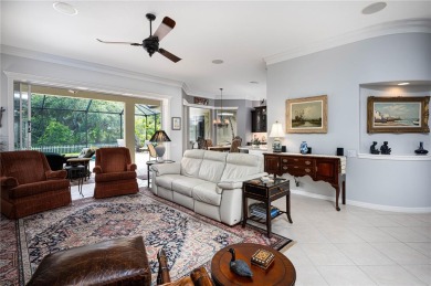 Curb appeal w/custom Landscaping, Dynamic Interior & private on Pelican Pointe Golf and Country Club in Florida - for sale on GolfHomes.com, golf home, golf lot