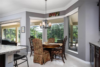 Curb appeal w/custom Landscaping, Dynamic Interior & private on Pelican Pointe Golf and Country Club in Florida - for sale on GolfHomes.com, golf home, golf lot