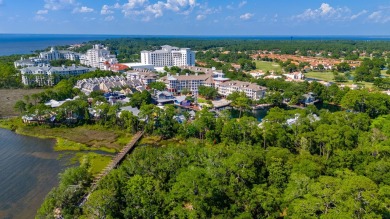 Indulge in coastal luxury living with this masterpiece crafted on Sandestin Golf and Beach Resort - Raven in Florida - for sale on GolfHomes.com, golf home, golf lot