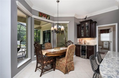 Curb appeal w/custom Landscaping, Dynamic Interior & private on Pelican Pointe Golf and Country Club in Florida - for sale on GolfHomes.com, golf home, golf lot