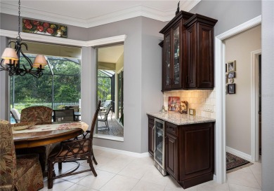 Curb appeal w/custom Landscaping, Dynamic Interior & private on Pelican Pointe Golf and Country Club in Florida - for sale on GolfHomes.com, golf home, golf lot