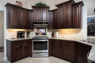 Curb appeal w/custom Landscaping, Dynamic Interior & private on Pelican Pointe Golf and Country Club in Florida - for sale on GolfHomes.com, golf home, golf lot