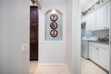 Curb appeal w/custom Landscaping, Dynamic Interior & private on Pelican Pointe Golf and Country Club in Florida - for sale on GolfHomes.com, golf home, golf lot