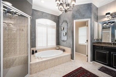 Curb appeal w/custom Landscaping, Dynamic Interior & private on Pelican Pointe Golf and Country Club in Florida - for sale on GolfHomes.com, golf home, golf lot