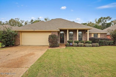 Discover this inviting 3-bedroom, 2-bathroom split-plan home in on Patrick Farms Golf Club in Mississippi - for sale on GolfHomes.com, golf home, golf lot