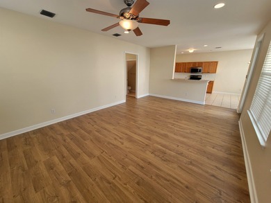 Welcome to this freshly updated 3-bedroom, 2.5-bath home located on Southwood Golf Club in Florida - for sale on GolfHomes.com, golf home, golf lot