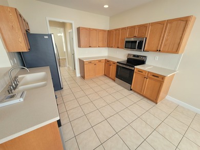 Welcome to this freshly updated 3-bedroom, 2.5-bath home located on Southwood Golf Club in Florida - for sale on GolfHomes.com, golf home, golf lot