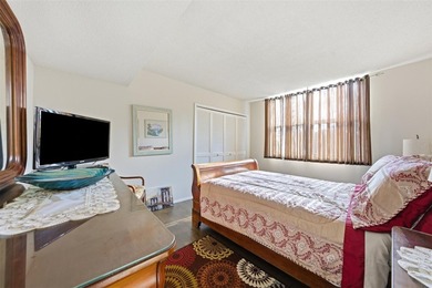 Welcome to this bright and spacious second-floor 3-bedroom on Palm-Aire Country Club and Resort - Palms in Florida - for sale on GolfHomes.com, golf home, golf lot