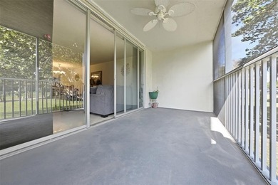 Welcome to this bright and spacious second-floor 3-bedroom on Palm-Aire Country Club and Resort - Palms in Florida - for sale on GolfHomes.com, golf home, golf lot